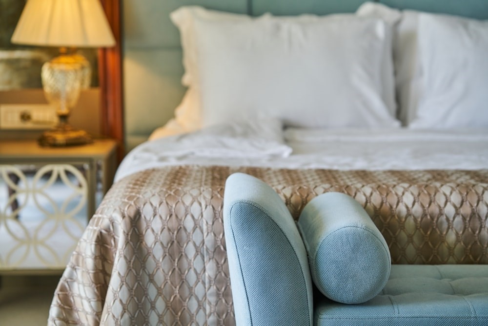 Pastel shades and varied textures work well together in this elegant bedroom